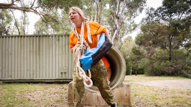 Skye Noyes finishes the tunnel course activity as part of Defence’s Work Experience Indigenous Youth Program at the Australian Defence Force Academy, Canberra. 