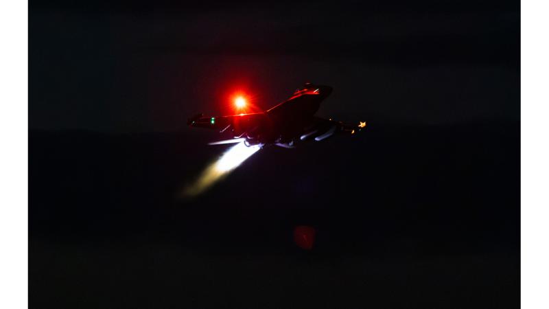 An F/A-18F Super Hornet from No 1 Squadron takes off at night during Exercise Diamond Shield 24.