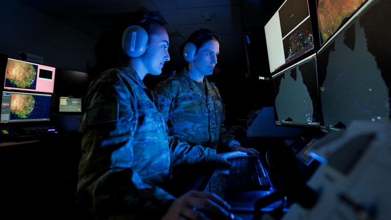 Air Surveillance Operators Corporal Emma Winter (right) and Aircraftwoman Olympia Achillea conduct taskings during Exercise Diamond Shield 24.