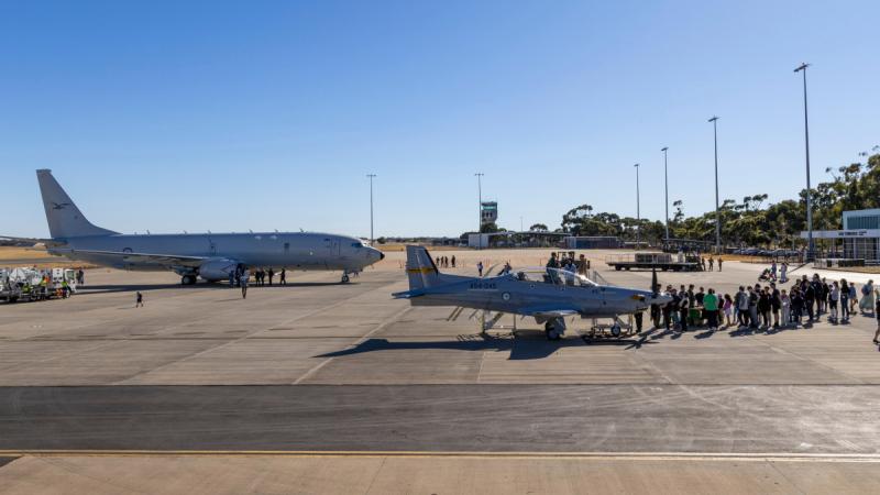 Crowds gather on the hardstand for a P-8A Poseidon and PC-21 static display during the community open day at RAAF Base Edinburgh, South Australia. 