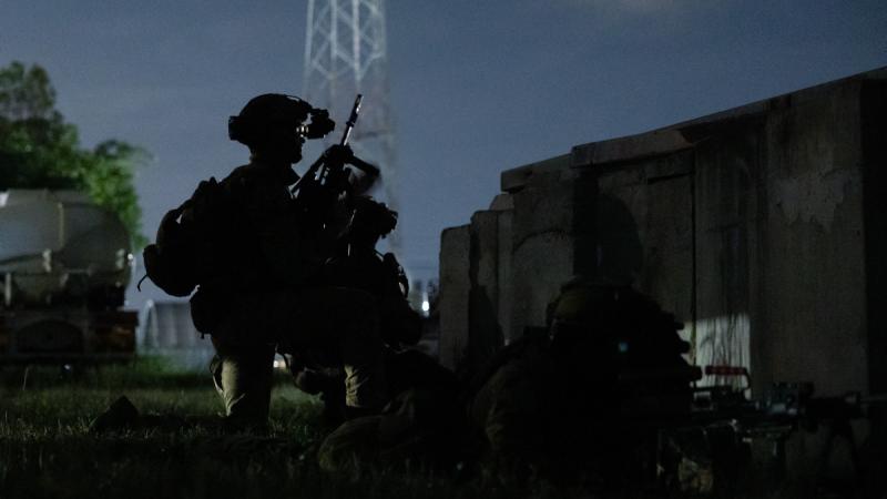 Soldiers from the 5th Battalion, the Royal Australian Regiment, prepare to lead a section during the Section Commanders Battle Course in Darwin, NT.