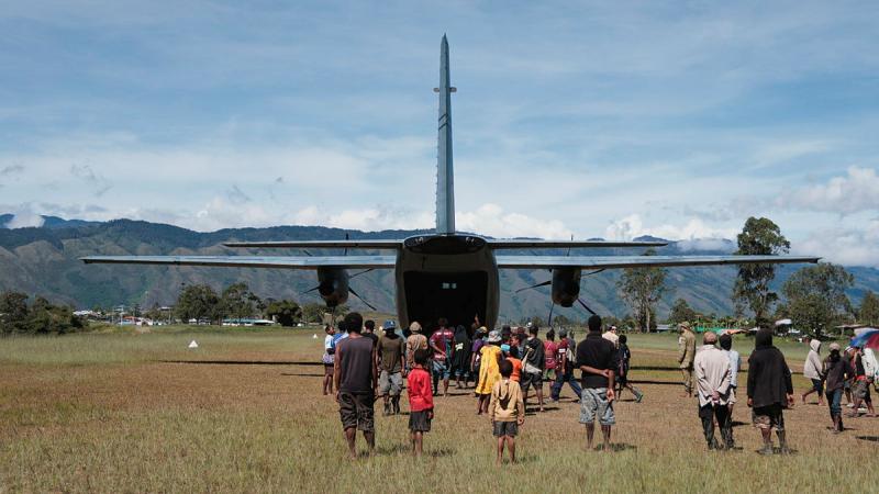 A RAAF C-27J Spartan from 35 Squadron parked at Telefomin airport, Papua New Guinea, during the Defence Pacific Air Program.