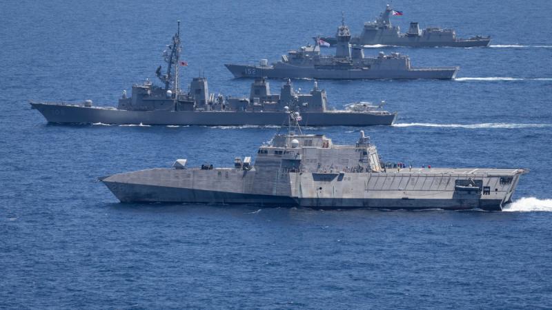 USS Mobile, JS Akebono, HMAS Warramunga and BRP Antonio Luna during a multilateral maritime cooperative activity between Australia, the United States, Japan and the Philippines off the coast within the Philippines Exclusive Economic Zone.