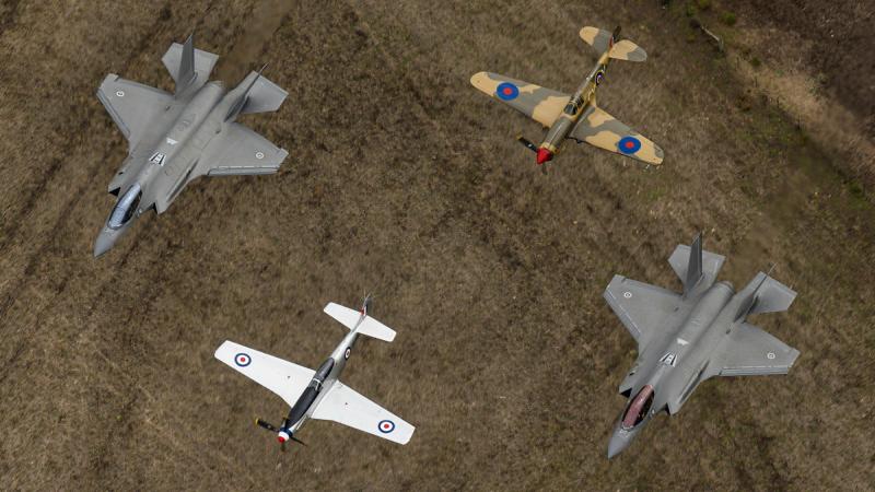 Two F-35A Lightning II aircraft from 77 Squadron in formation with a CAC CA-18 Mustang and a Curtiss P-40E Kittyhawk during Warbirds Over Scone 2024.