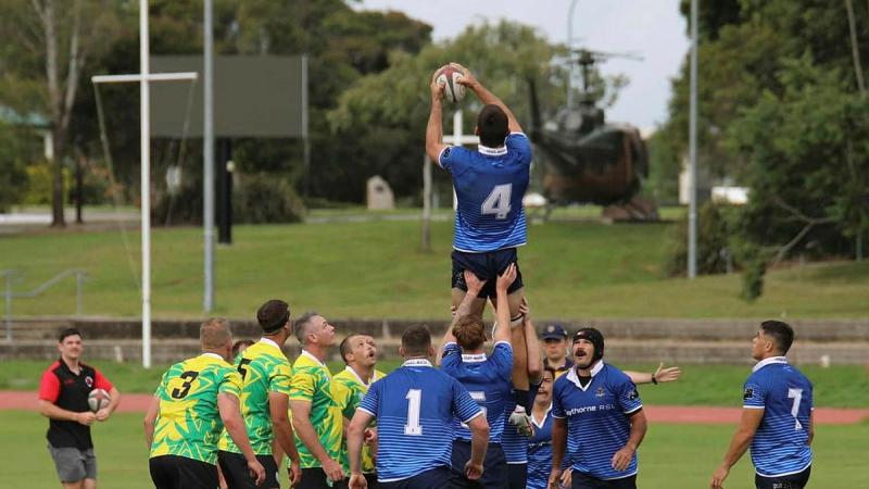 Members from 7th Brigade and Land Combat College taking part in the Inter-Brigade Rugby Championships 2024 final at Duncan Oval, Gallipoli Barracks. 