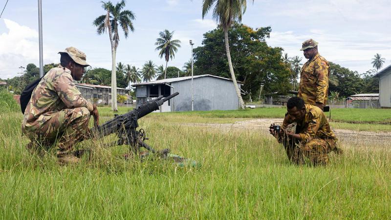 Papua New Guinea Defence Force soldiers pose for one another during practical exercises on the Smartphone Public Relations Course, Moem Barracks, PNG. 