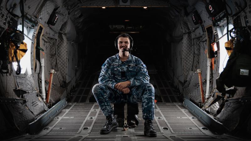 Aircraftman Finlay Austin, from 27 Squadron, on a C-27J Spartan aircraft in Papua New Guinea during the Defence Pacific Air Program.