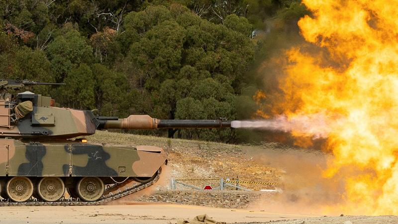 An Australian Army M1A1 Abrams Main Battle Tank fires its 120mm cannon during a live-fire serial for the Coral Balmoral Cup.