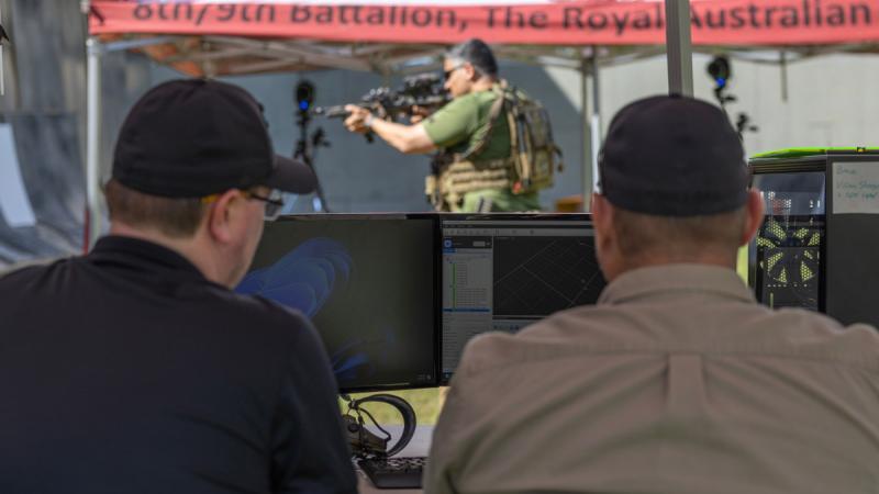 Scientists from La Trobe University calibrate motion-capture cameras during a marksmanship training trial at Enoggera Barracks, Brisbane.