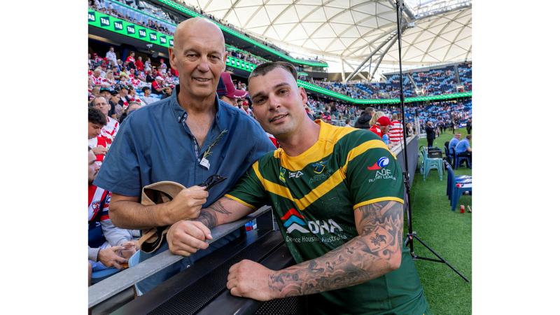 Darren Nolan with his son Leading Aircraftman Daniel Nolan after the Anzac Day rugby league clash at the Sydney Football Stadium. 