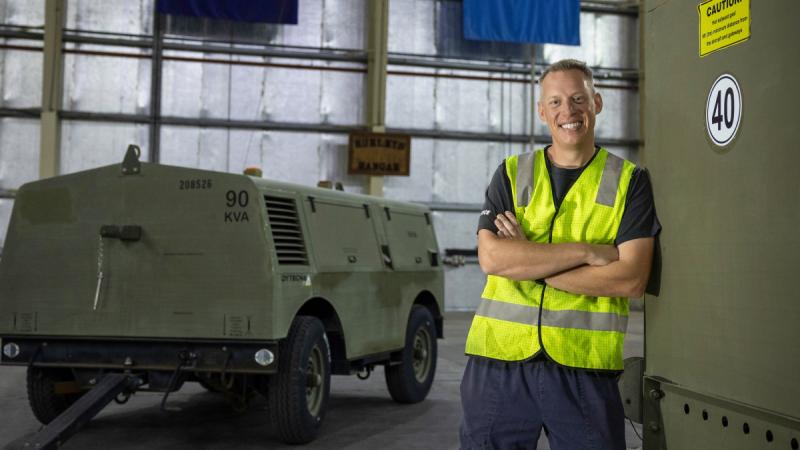 Air Force ground support equipment technician Corporal John Chapman inside Hurley's Hanger at Australia's main operating base in the Middle East. Photos: Corporal Jacob Joseph