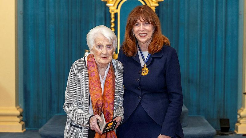  Victorian Governor, Margaret Elaine Gardner (right), presents the daughter of Pilot Officer David Taylor, Margaret Ekberg, with her father's Medal for Gallantry for heroism in PNG during World War 2. 