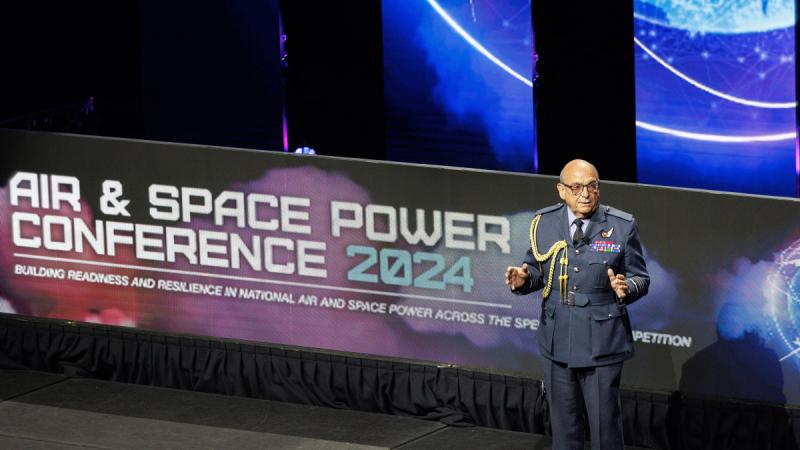 The UK Prime Ministers Special Envoy to the Western Balkans, Air Chief Marshal The Lord Stuart Peach, addresses the 2024 Air and Space Power Conference at the National Convention Centre in Canberra.