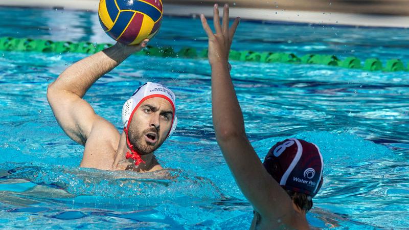 Flight Lieutenant Peter Spearman looks to shoot the ball during a match against Water Polo Queensland (Navy) at the Australian Country championships at the Gold Coast Aquatic Centre, Queensland. 