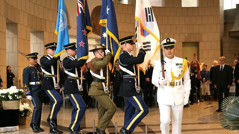 Private Kieran Findlay (centre) in the United Nations Command Honor Guard at an Anzac Day Dawn Service at the War Memorial of Korea.
