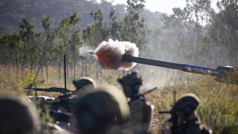 Army gunners from the 1st Regiment, Royal Australian Artillery, firing an M777 Howitzer and taking up defensive firing positions, at Shoalwater Bay Training Area