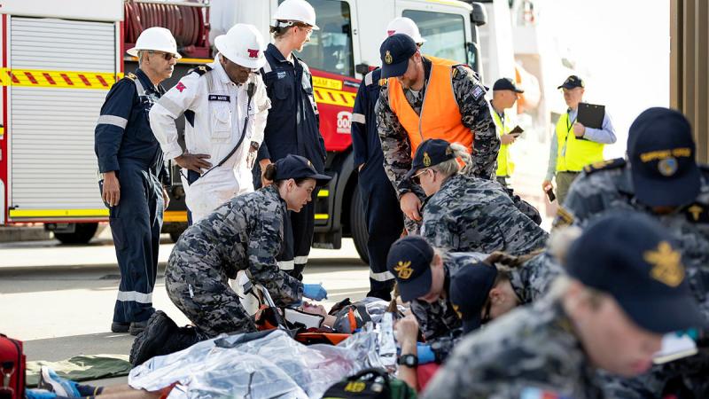 HMAS Stirling personnel and WA Emergency Services care for casualties during Exercise Vulcan Phoenix 2024 at Fleet Base West, WA. 
