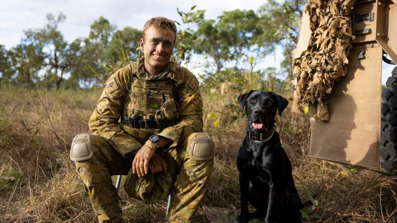 Sapper Flynn Skerke-Erwin and explosive detection dog, Ethan. 