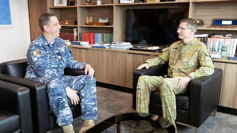 Senior Enlisted Advisor to the Chief of Defence Force Warrant Officer Ken Robertson talks with Chief of Defence Force General Angus Campbell.