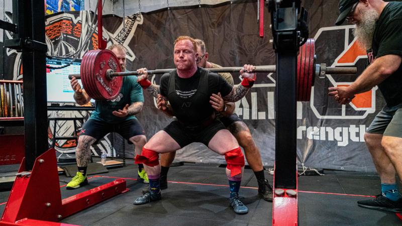 Army soldier Sergeant Conor Reilly squats 290kgs at the Australian Powerlifting Competition in the 2024 Queensland state qualifier.