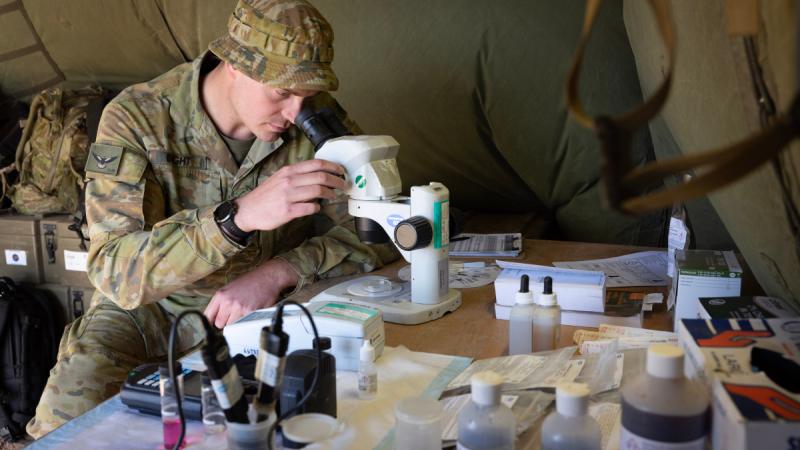 Australian Army environmental health officer Lieutenant Joel Bright from the 3rd Health Battalion at his field laboratory during Exercise Rhino Run at Cultana Training Area, South Australia. Photo: Sergeant Matthew Bickerton