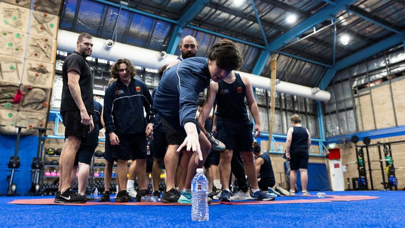 Students from Chifley College conduct a team building exercise during a visit to Fleet Base East in Sydney. Photos: Leading Seaman Daniel Goodman