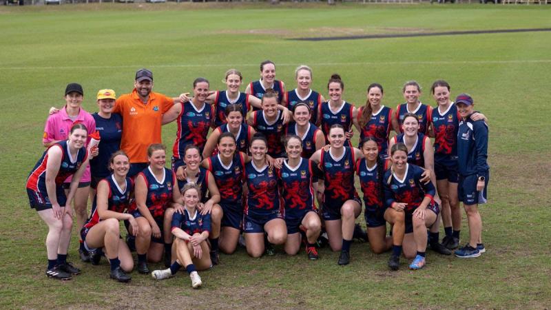 Members of HMAS Stirling’s Women’s team celebrate advancing to the Peel Football League Finals in their inaugural season in 2023