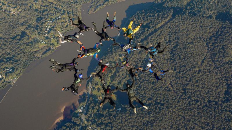 ADF members complete a 15 way formation in the sky over Moruya, NSW during the Winter Warriors camp