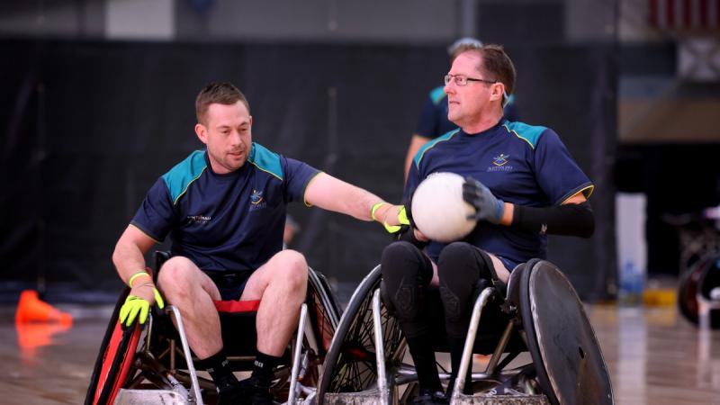 Team Australia's Ben Owens moves past Jamie Adam Smyth during a wheelchair rugby training session in preparation for the Warrior Games 2024. Photo: Flight Sergeant Christopher Dickson