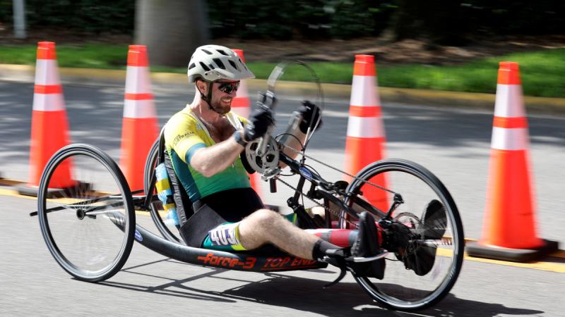 Lieutenant Commander Alex Hale competes in the men's recumbent cycling at the Warrior Games. 