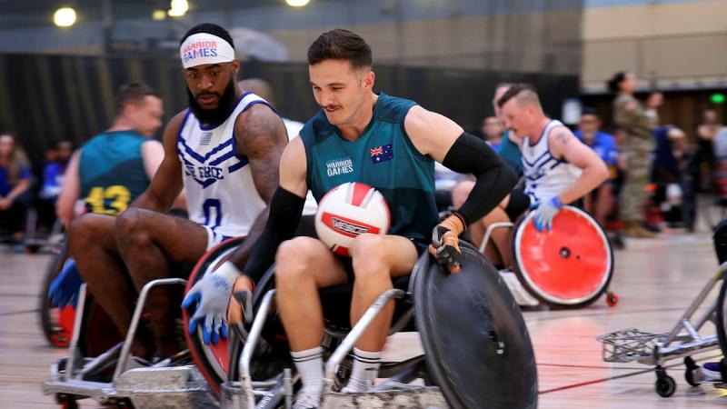 Team Australia's Cooper Blackwood makes a break during the wheelchair rugby game against United States Air Force at the Warrior Games, in Orlando, Florida. Photo: Flight Sergeant Christopher Dickson