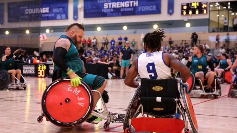 Luke Manhire, from Team Australia, defends against a United States Air Force player in the wheelchair rugby competition at the Warrior Games 2024. Photo: Flight Sergeant Christopher Dickson.