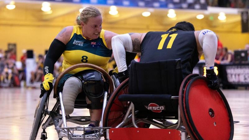 Ainsley Hooker defends against a Team Army competitor during a wheelchair rugby match at the ESPN Wide World of Sports Complex, Florida USA. Photo: Flight Sergeant Ricky Fuller.