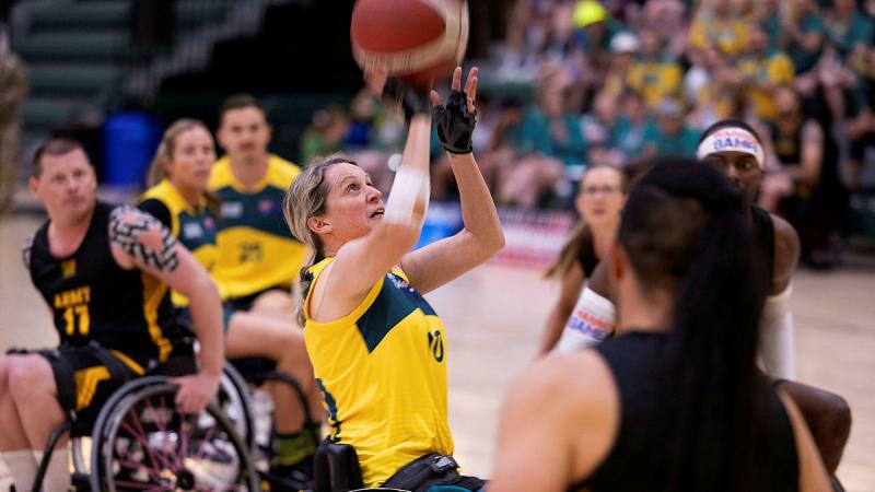 Warrior Games 2024 Team Australia competitor Tricia Reynolds takes a shot during a wheelchair basketball match against Team Army at the ESPN Wide World of Sports Complex, Florida USA. 