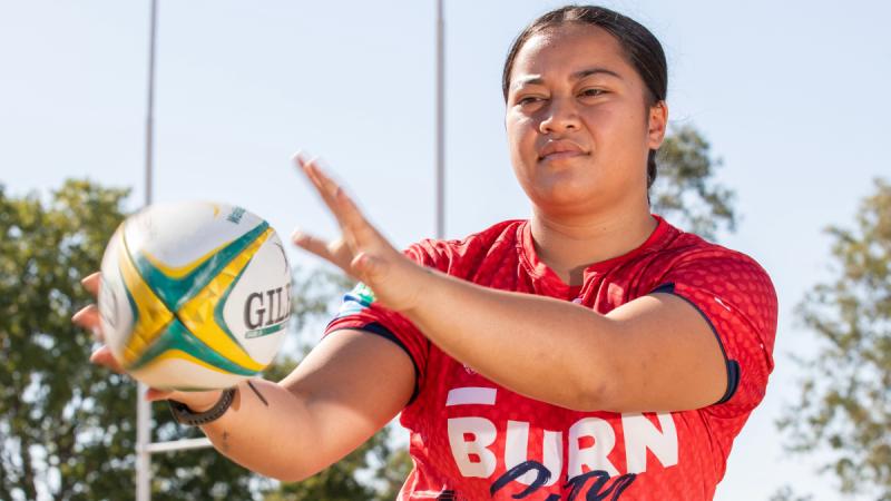 Leading Aircraftwoman Hope Kareta from 2 Security Forces Squadron, in her Melbourne Rebels rugby uniform at RAAF Base Amberley, Queensland. Photos: Aircraftsman Campbell Latch.