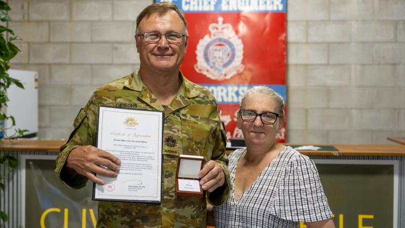 Australian soldier Warrant Officer Class One David Gibbons with the Federation Star clasp to his Defence Long Service Medal for 40 years of service with his wife Sam, at Gallipoli Barracks in Enoggera, Queensland.