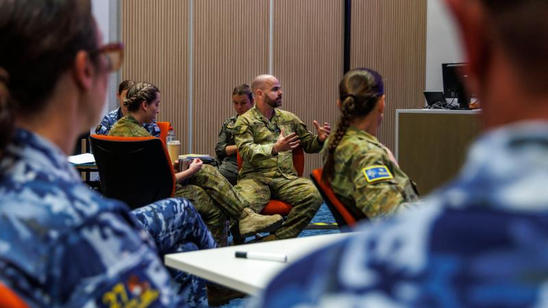 Flight Lieutenant Rob Iglesias speaks during a Gender in Military Operations symposium at RAAF Base Amberley, Queensland.