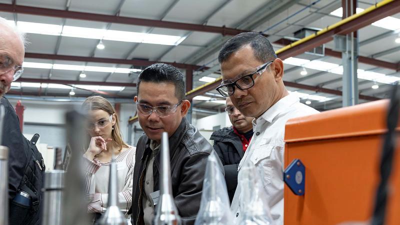 Members of the Service Attachés and Advisers Group Engagement Program during an industry visit to Axiom Precision Manufacturing in South Australia.