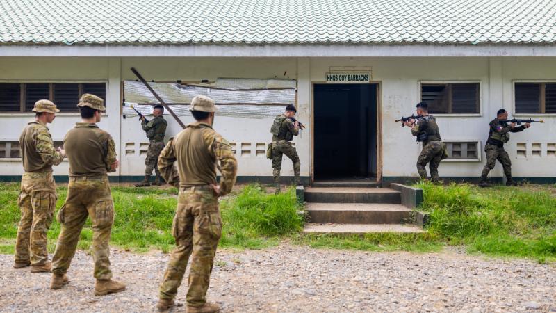 Philippine Army soldiers conduct an urban clearance serial led by the joint Australian training team - Philippines at Camp Melchor F. Dela Cruz.