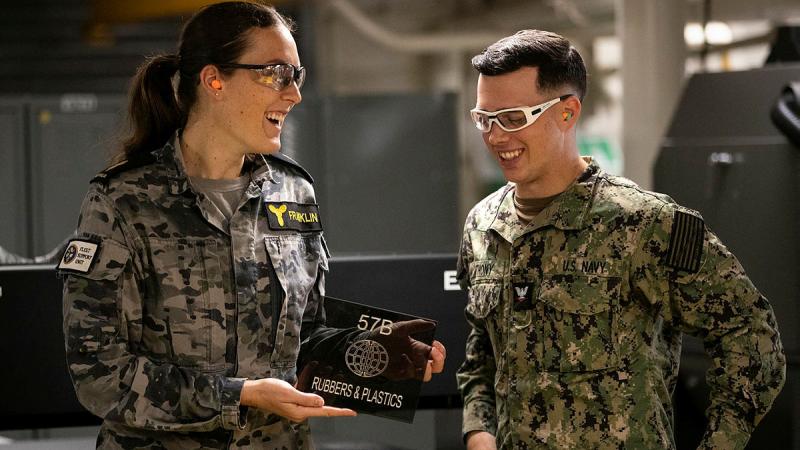 Able Seaman April Franklin and her US Navy counterpart, Petty Officer 3rd Class Reef Anthony, on board USS Emory S. Land during the ship’s visit to Cairns, Queensland. Photos: Leading Seaman Ernesto Sanchez