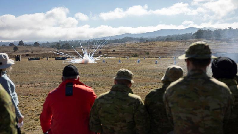 Students of the University of New South Wales Master of Explosive Ordnance degree observe an energetic substance demonstration at Majura Training Area, Canberra.