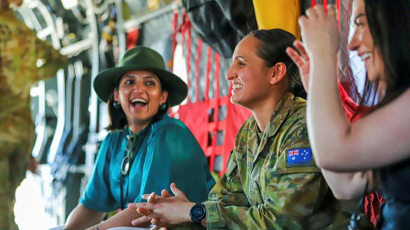 A 16th Aviation Brigade member provides a capability brief on the CH-47F Chinook to the Women Leaders Study Tour attendees at RAAF Base Townsville.