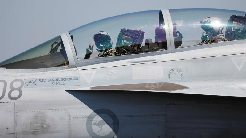 Crew of a 6 Squadron EA-18G Growler aircraft taxiing at RAAF Base Darwin.