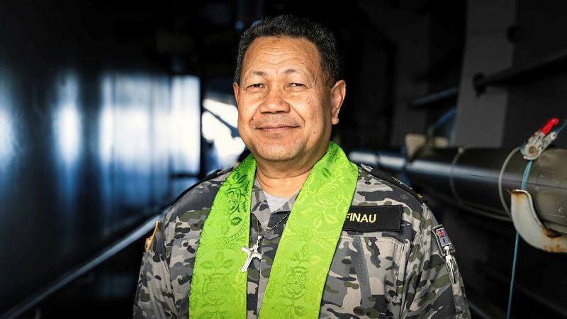 Chaplain Simote Finau on board HMAS Choules as the ship travels off the coast of Tonga during a south-west Pacific regional presence deployment. Photo: Leading Seaman Matthew Lyall