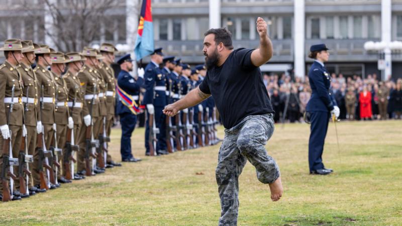 The Navy Indigenous Group Bungaree perform an Acknowledgement of Country and an Indigenous dance during the Chief of Defence Force Change of Command Parade at Russell Offices, Canberra.