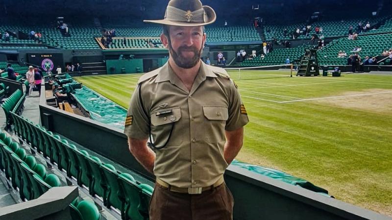 Australian Army soldier Sergeant Lars Jessop on Centre Court at Wimbledon, where he volunteered as a military steward.