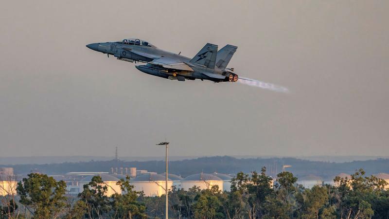 A RAAF FA-18F Super Hornet aircraft departs RAAF Base Darwin for a night flying mission as part of Exercise Pitch Black 2024. 