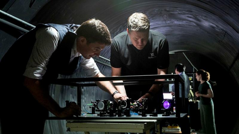 Defence Science and Technology Group scientist Dr Ben Sparkes (left), working with Australian- built quantum clocks at the University of Adelaide.