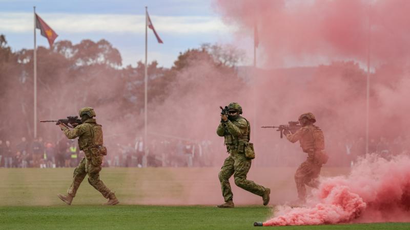 Army soldiers from the Royal Military College at Duntroon put on a simulated infantry assault as part of the ADFA open day in Canberra on August 19, 2023.