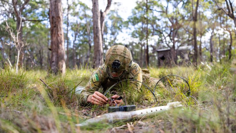 An Australian Army sapper from the School of Military Engineering prepares a fuse during Exercise Bardia, at the Holsworthy Training Area, Sydney.